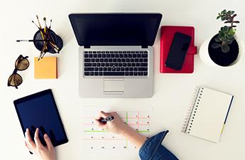 Table with Laptop and calendar